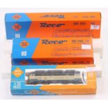 Three Roco H0 gauge locos: 4151 diesel V125 DB 215 033-2 blue/cream (E-BF-G); 04136A electric DB 140