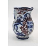 A 20th century faience pottery jug, the central crest printed BEMSE MERE SE, flanked by mythical