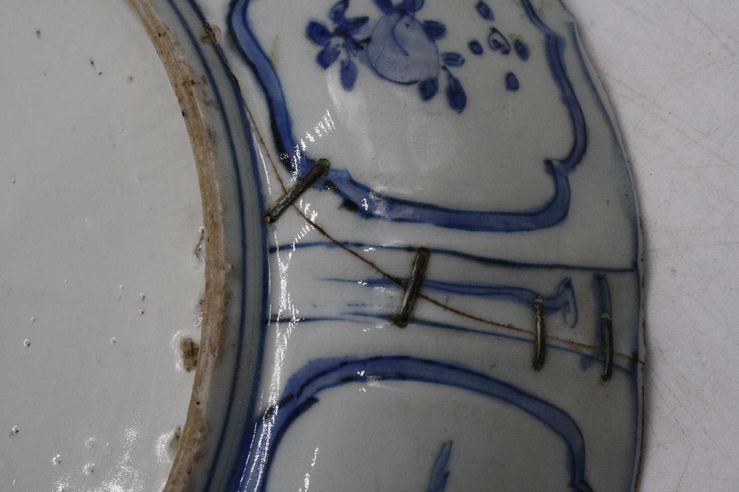 A 19th century Delft bowl on a pale blue ground decorated with flowers, dia. 26cm, together with a - Image 9 of 10