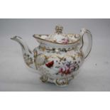 A Victorian Rockingham style teapot and cover, of compressed melon form, on a white ground hand-