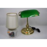 A Wedgwood porcelain Peter Rabbit table lamp, 31cm high including shade, together with a brass