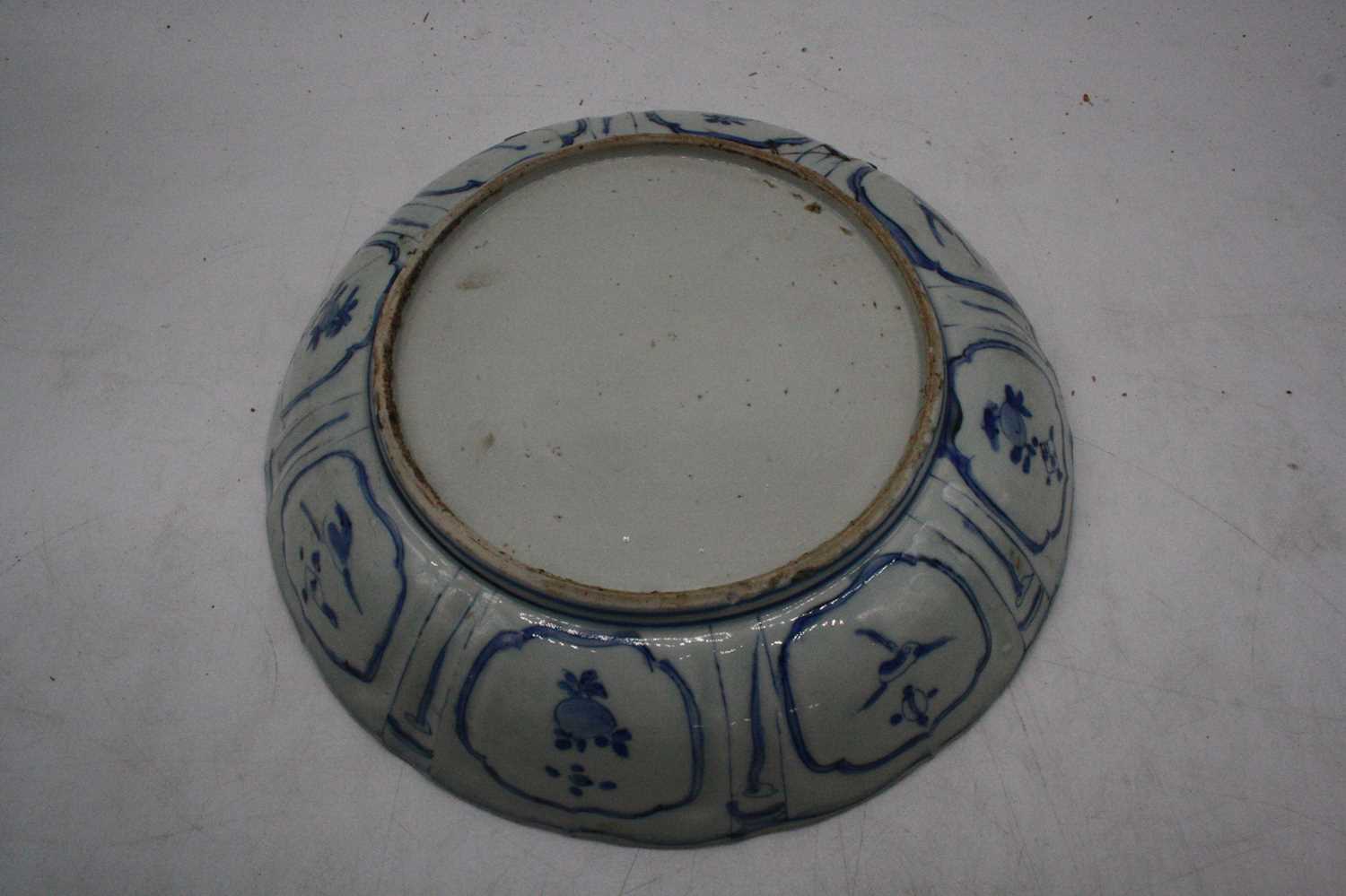 A 19th century Delft bowl on a pale blue ground decorated with flowers, dia. 26cm, together with a - Image 6 of 10