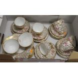 A Royal Stewart floral decorated porcelain part tea service