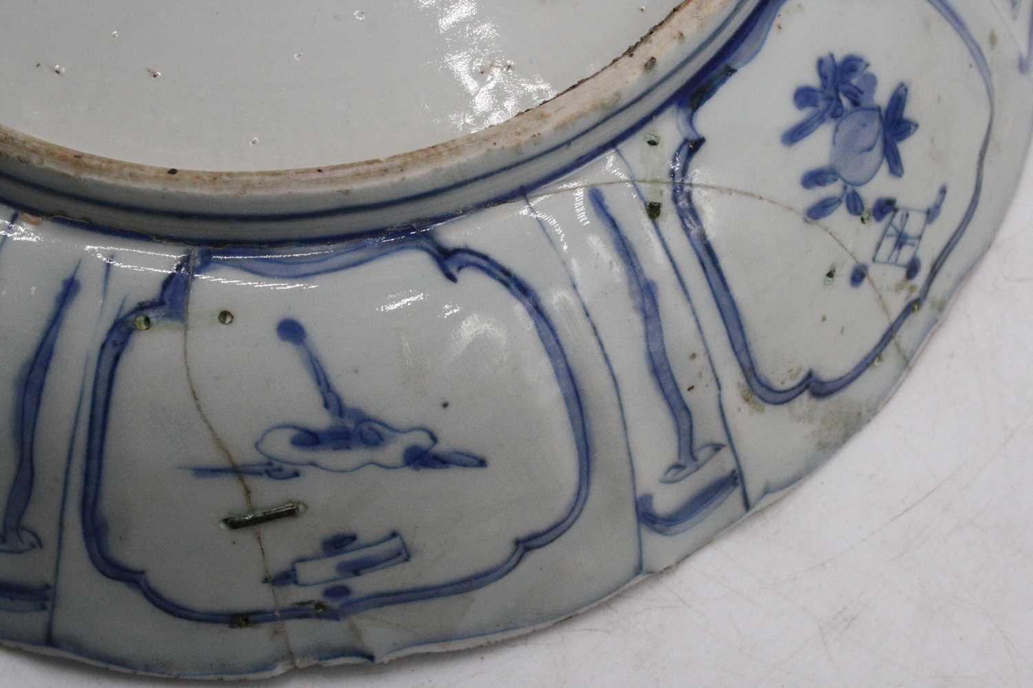 A 19th century Delft bowl on a pale blue ground decorated with flowers, dia. 26cm, together with a - Image 5 of 10