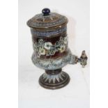 A Victorian Doulton Lambeth stoneware water filter and cover, on a blue and brown ground with floral