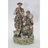 A large early 20th century Royal Dux figure group, the man in standing pose playing pipes, his