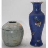 A Chinese enamel decorated porcelain baluster vase, 29cm high, together with a Chinese blue &