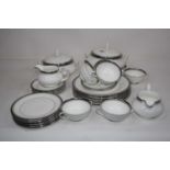 A Royal Doulton 6 place setting dinner and tea service in the Sarabande pattern, H5023