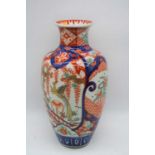 A Japanese Imari porcelain vase decorated with birds amongst flowers, 32cm high