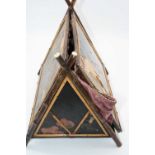 A Japanese black lacquered and bamboo framed box of triangular form, height 31cm