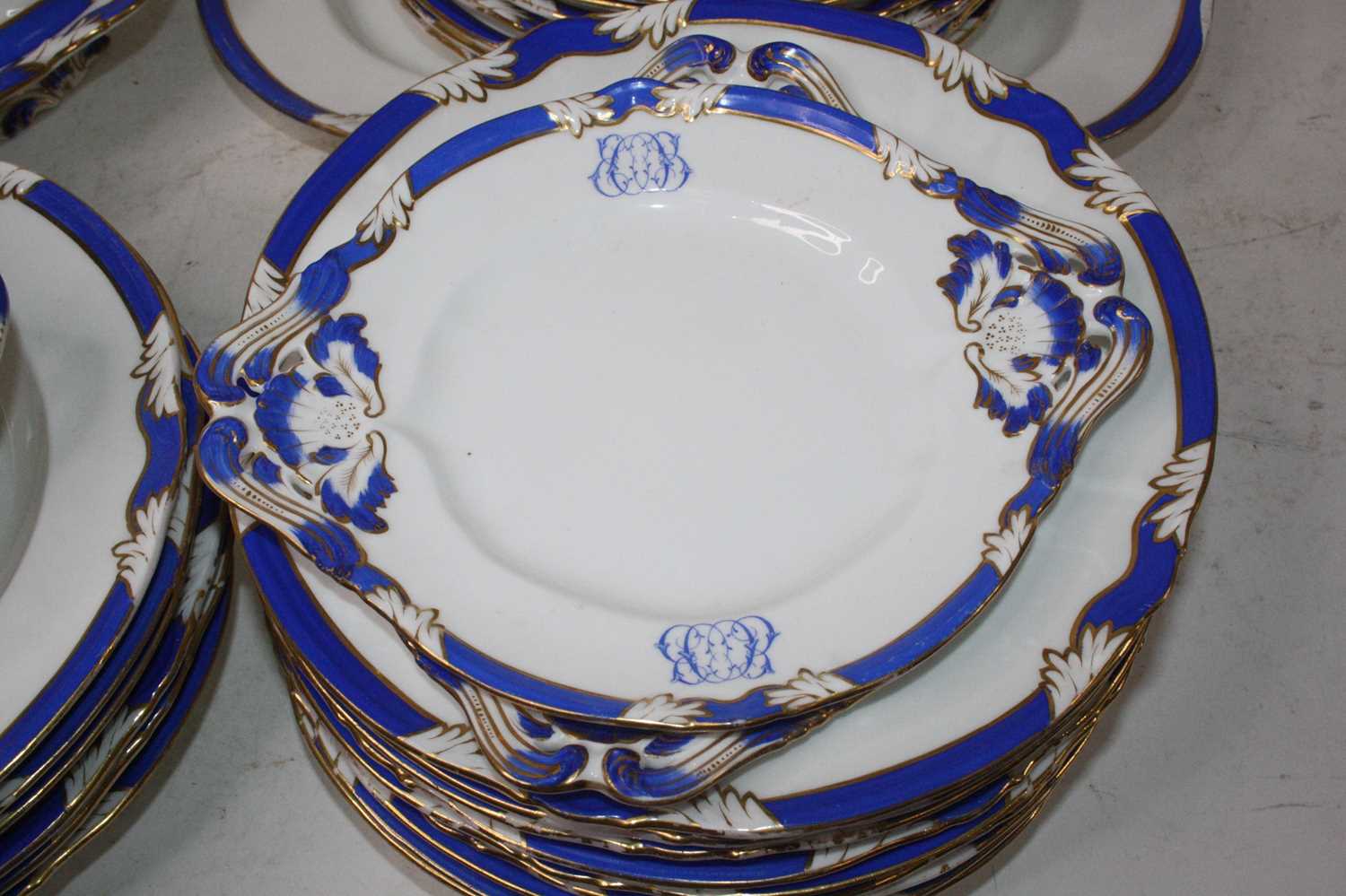 A Victorian Daniell part dinner service, on a white ground with blue borders and heightened in gilt, - Image 5 of 5