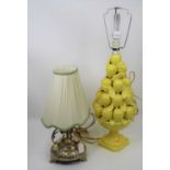 A 20th century yellow glazed pottery table lamp, in the form of a bowl of lemons, height 70cm