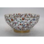 A Copelands Spode porcelain bowl, enamel decorated with birds amongst flowers, 23cm wideThs item