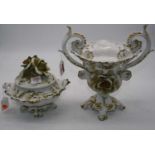 A 20th century Italian white glazed floral encrusted urn, 28cm high, together with a similar jar and