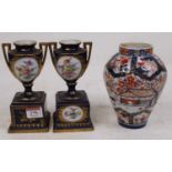 A pair of late 19th century / early 20th century Austrian Vienna style porcelain vases, each of