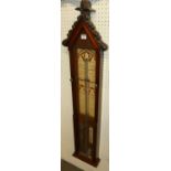 A Circa 1900 mahogany Admiral Fitzroy barometer, with typical glazed trunk door and printed inset,