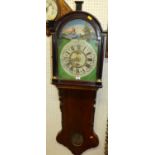 A Dutch hanging wall clock, having a painted arched dial with pendulum, (with crack to glazed