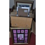 Two boxes of assorted pictures, prints, and frames