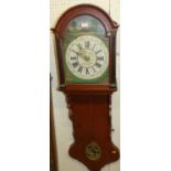 A Dutch oak drop trunk wall clock with alarm and having painted arch dial, weight driven 30 hour