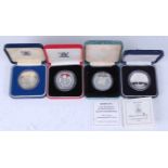 Bermuda, a collection of four Royal Mint silver proof coins, to include 1985 $1, 1990 $1, 1992 $2