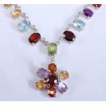 A sterling silver multi-stone fringe necklace, featuring a combination of garnet, amethyst, lemon