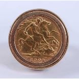 An Edward VII half sovereign dated 1903 in a 9ct yellow gold ring mount, head diameter 22mm, size