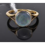 A yellow metal and cabochon opal set ring, stamped 18ct, 3.9g, size N