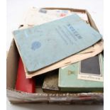 A box of miscellaneous items, to include vintage football programmes, cigarette cards, cigarette