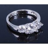 A white metal and cz set three-stone ring, stamped 925, 3.4g, size Q