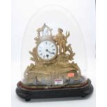 A 19th century French gilt metal figural mantel clock, the enamel dial showing Roman numerals,