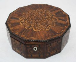 A late Regency specimen wood workbox of dodecagon shape the hinged lid inlaid with rosewood,