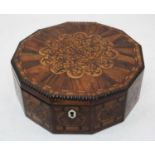 A late Regency specimen wood workbox of dodecagon shape the hinged lid inlaid with rosewood,