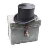 A 20th century brushed silk top hat, bearing label for Moss Brothers, in Moss Brothers Covent Garden