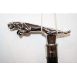 A reproduction walking stick, the handle in the form of a Jaguar car mascot