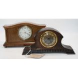 An early 20th century oak cased mantel clock, the dial decorated with a classical scene of Cupid and