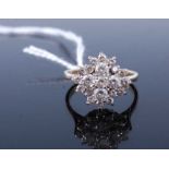 A modern 9ct gold and CZ set flowerhead cluster ring, 3.8g, size O