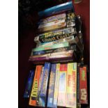 Three boxes of assorted board games to include Monster Mash, Donkey Kong, Ghost Castle,