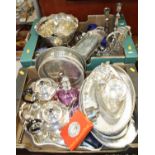 Two boxes of silver plated wares, to include a pressed glass claret jug, pair of table candlesticks,