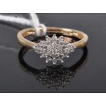 A modern 9ct gold diamond lozenge cluster ring, total diamond weight stated as 0.15 carats, 1.6g,
