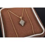 A 9ct gold and diamond point set lozenge cluster pendant, on finelink neck chain, pendant dimensions