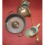 A large copper flagon, together with a copper twin handled preserve pan, a smaller flagon, an enamel
