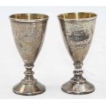 A pair of early 20th century eastern European silver kiddush cups, each of typical conical form