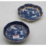 An 18th century Caughley Salopian ware blue and white dish, decorated with a Chinese landscape and