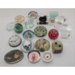 A collection of glass paperweights, to include millefiore examples