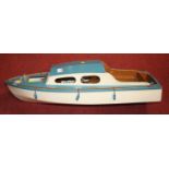A painted wooden model boat, 64cm