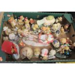 A collection of Cherished Teddies resin models