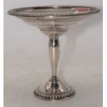 A 20th century pierced silver comport, stamped sterling to the underside, 25.5cm high