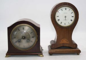 An Edwardian mahogany and ebony strung mantle clock having a convex silvered dial with Roman
