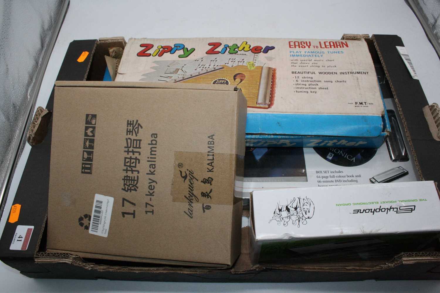 A boxed Japanese FMT Zippy Zither, boxed, together with a 17 key kalimba, and a Simply Harmonica - Image 7 of 7