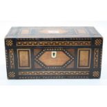 A Victorian specimen wood tea caddy of rectangular form having geometric design inlaid with oak,